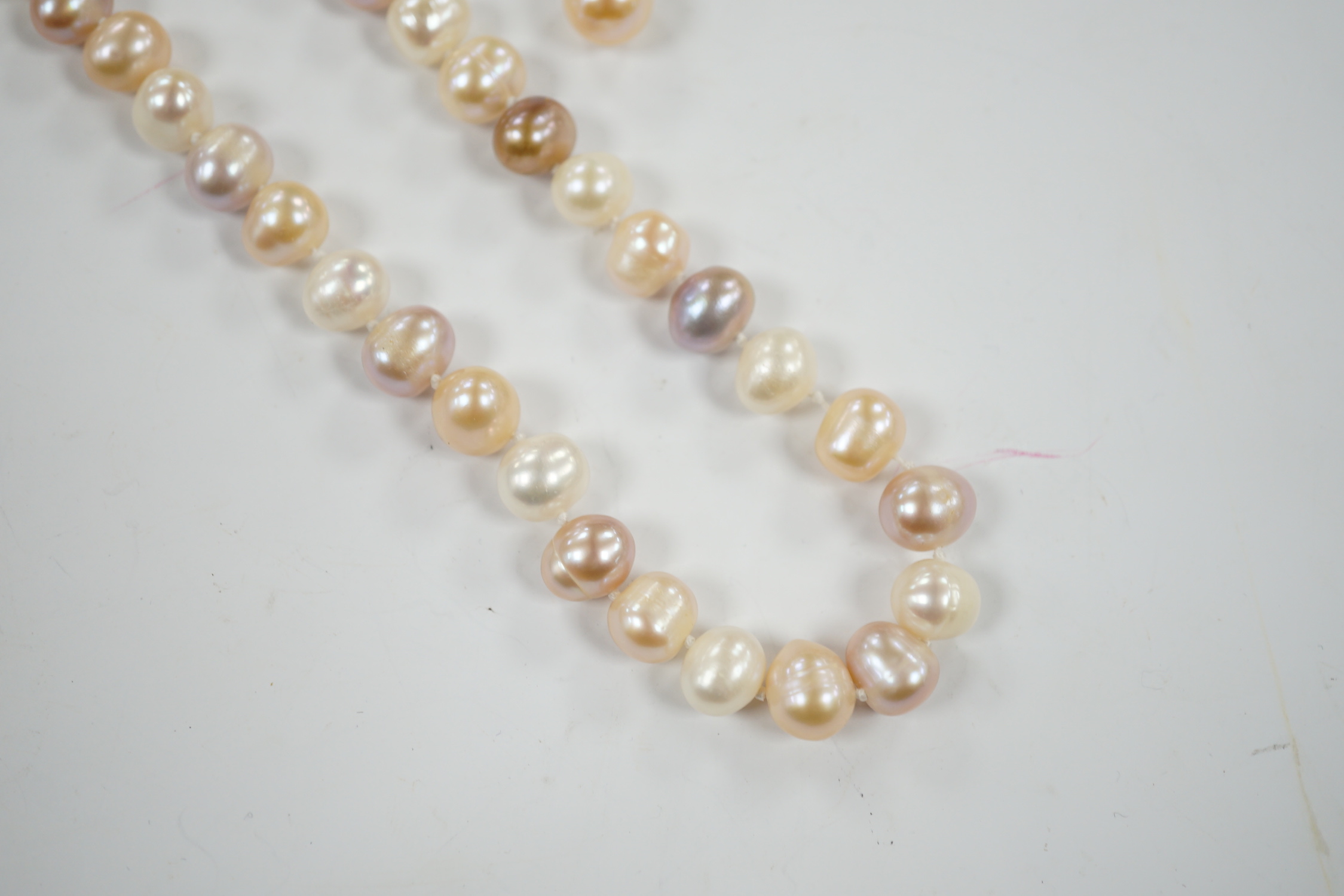 A single strand multi coloured freshwater pearl necklace, 44cm and a pair of freshwater pearl drop earrings.